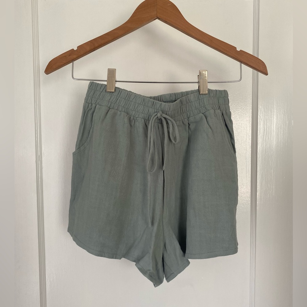 Size small. She + Sky shorts. Light blue/teal.